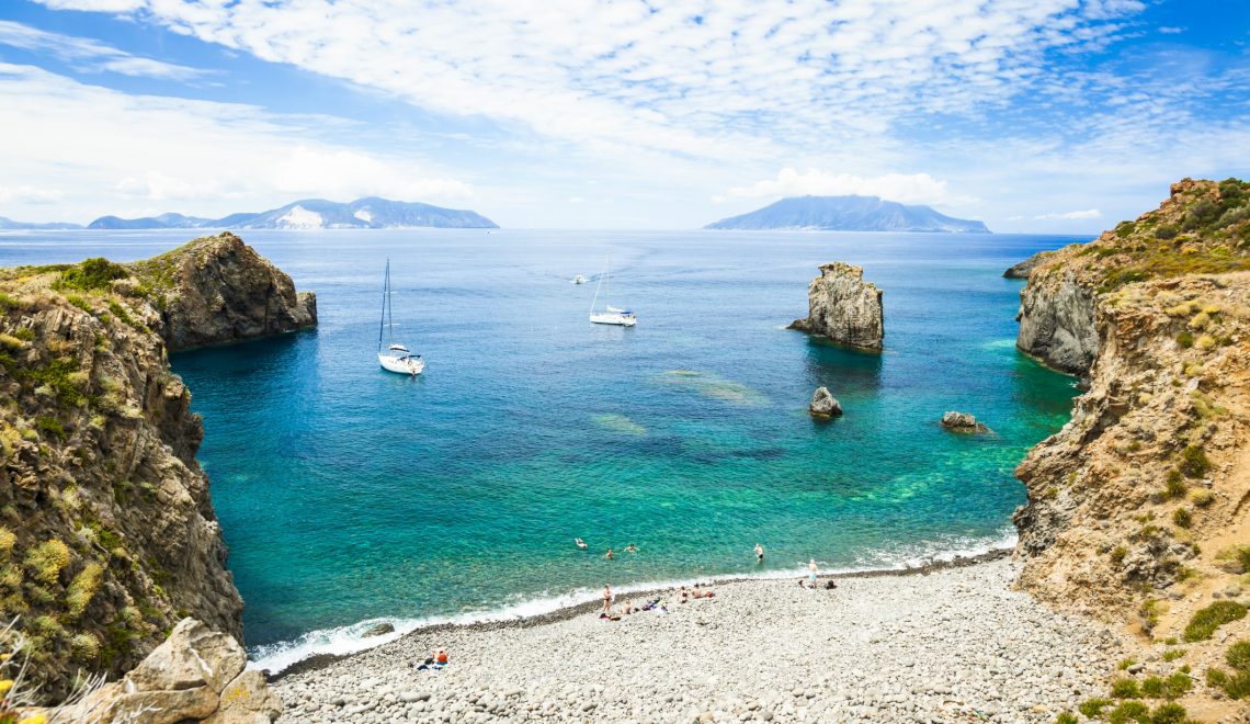 Cala Junco - small bay of Panarea - one of Aeolian Islands near Sicily (Italy). Lipari and Salina islands visible on the horizon.