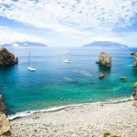 Cala Junco - small bay of Panarea - one of Aeolian Islands near Sicily (Italy). Lipari and Salina islands visible on the horizon.