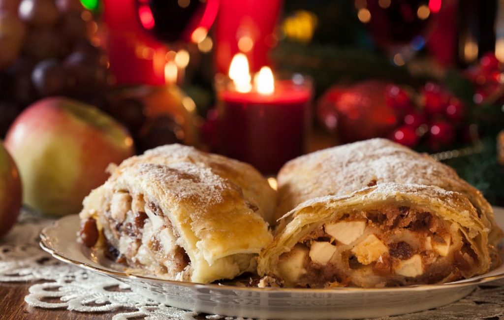 Apple Strudel, filled with spiced apples and raisins, is a popular dessert during Christmas time
