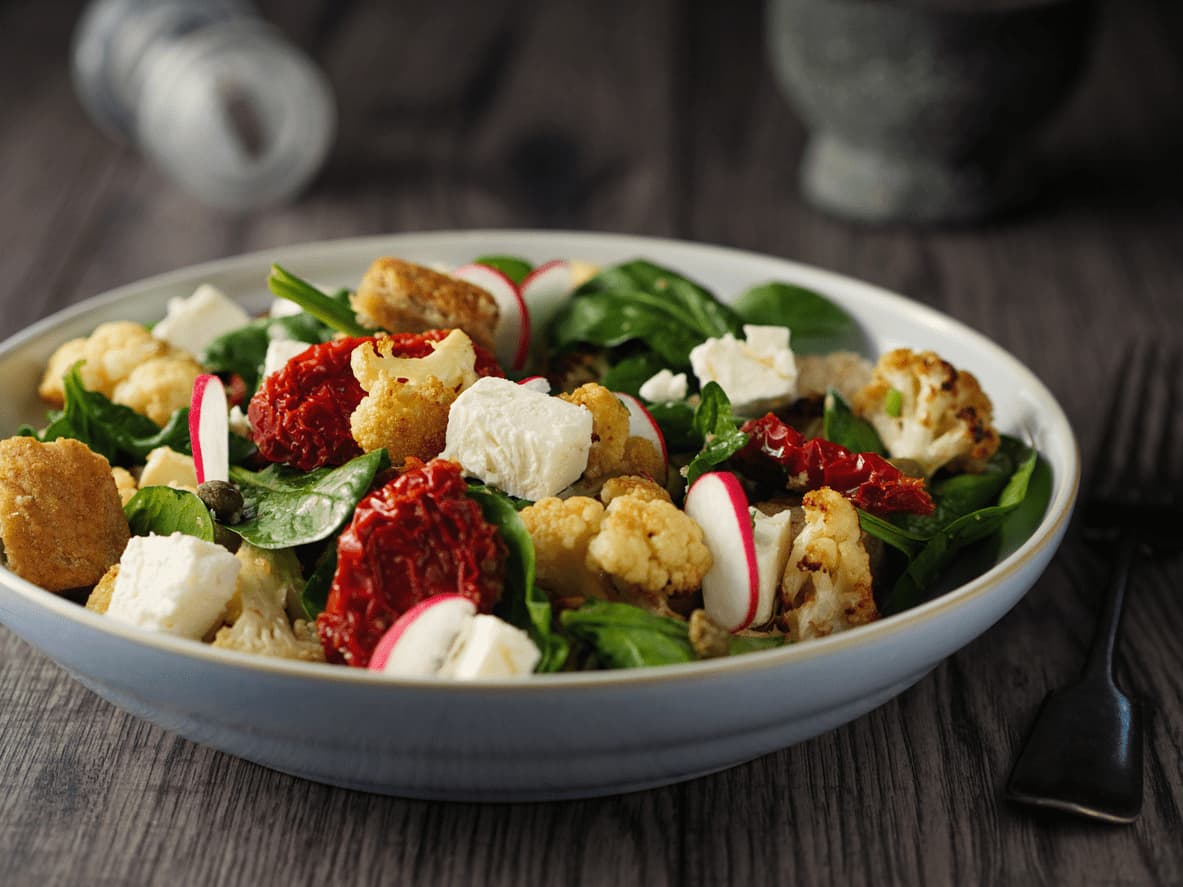  Panzanella, a Tuscan bread salad that combines chunks of soaked stale bread with tomatoes, onions, cucumbers, basil, and a tangy vinaigrette