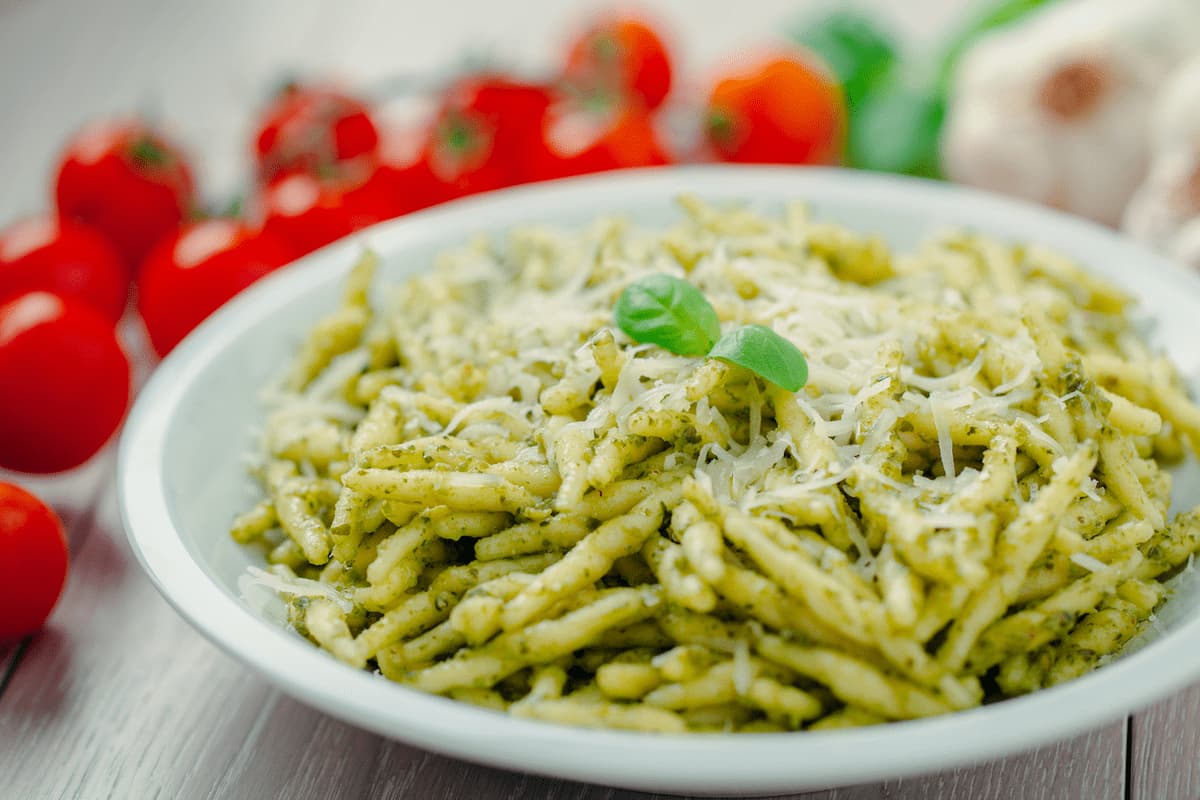 Pesto alla Genovese: basil, garlic, pine nuts, Parmigiano-Reggiano, Pecorino cheese, and olive oil