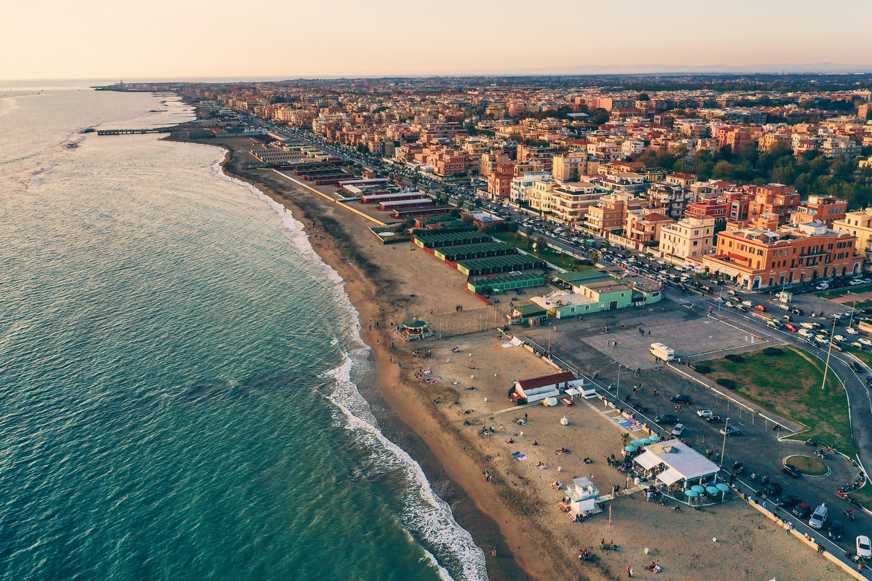 Aerial view of Ostia beach near Rome, Italy. Beautiful sea, coast and city view from above, drone photo.