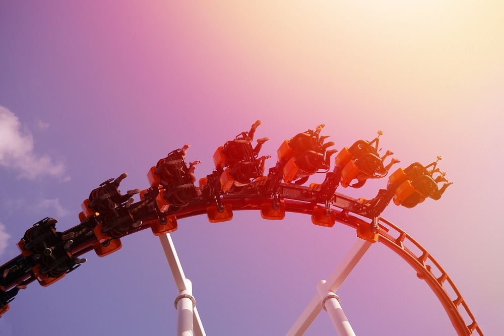 view of rollercoaster with people